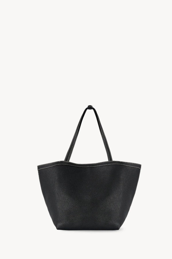 Front view of black park tote three stitch on white background, with no model shown.