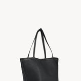 Front slanted view of black park tote three stitch on white background, with no model shown.