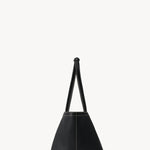 Side view of black park tote three stitch on white background, with no model shown.