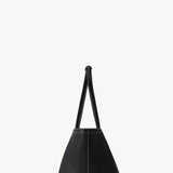 Side view of black park tote three stitch on white background, with no model shown.