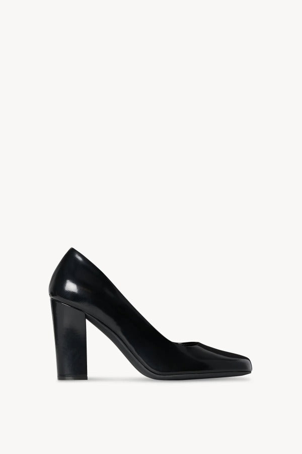 Right side view of black penelope pump on white background, with no model shown.