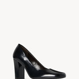Right side slanted view of black penelope pump on white background, with no model shown.