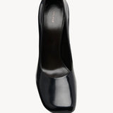 Overhead view of black penelope pump on white background, with no model shown.