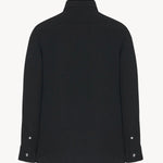 Back view of black petra shirt on white background, with no model shown.