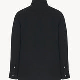 Back view of black petra shirt on white background, with no model shown.