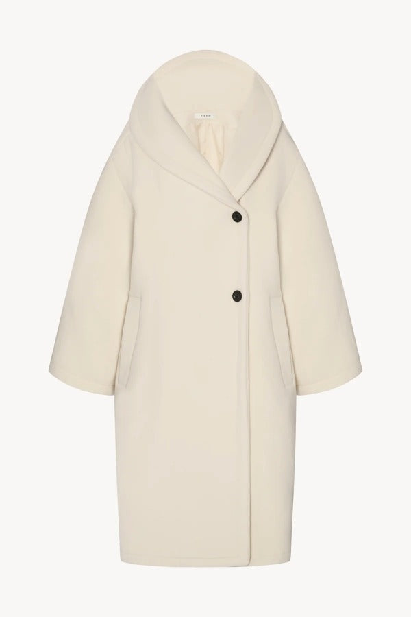Front view of ivory regino coat on white background, with no model shown.