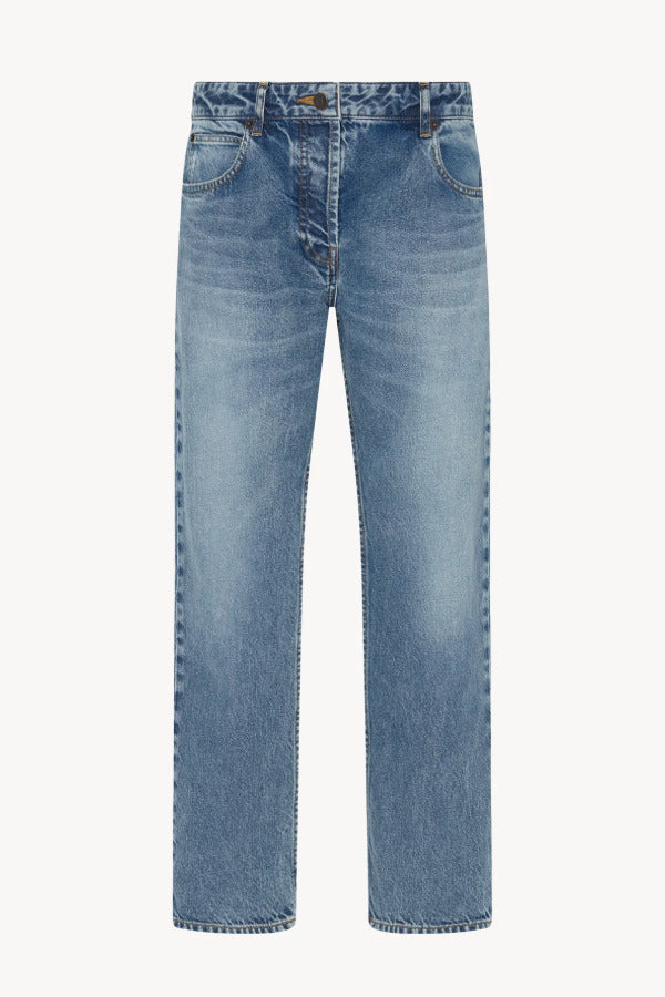 Front view of medium blue riaco jean on white background, with no model shown.