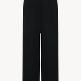 Back view of black roger pants on white background, with no model shown.