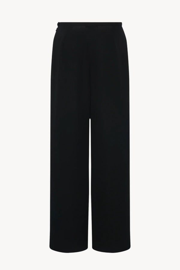Back view of black roger pants on white background, with no model shown.