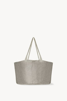Front view of steel mesh bag on white background, with no model shown.