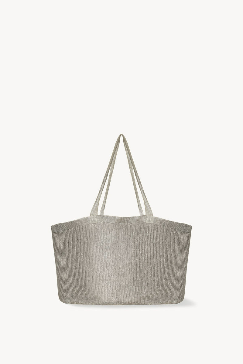 Front view of steel mesh bag on white background, with no model shown.
