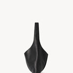 Alternate side view of black small bindle stitch bag on white background, with no model shown.