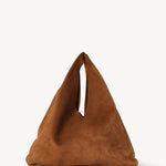 Front view of bistre/ecru small suede bindle bag on white background, with no model shown.