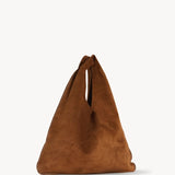 Front slanted view of bistre/ecru small suede bindle bag on white background, with no model shown.