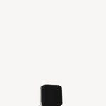 Front slanted view of black small zip wallet on white background, with no model shown.