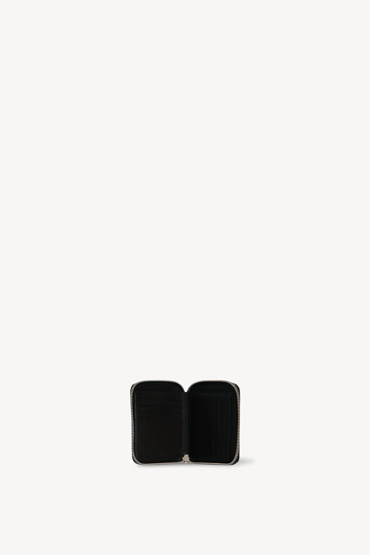 Open view of black small zip wallet on white background, with no model shown.