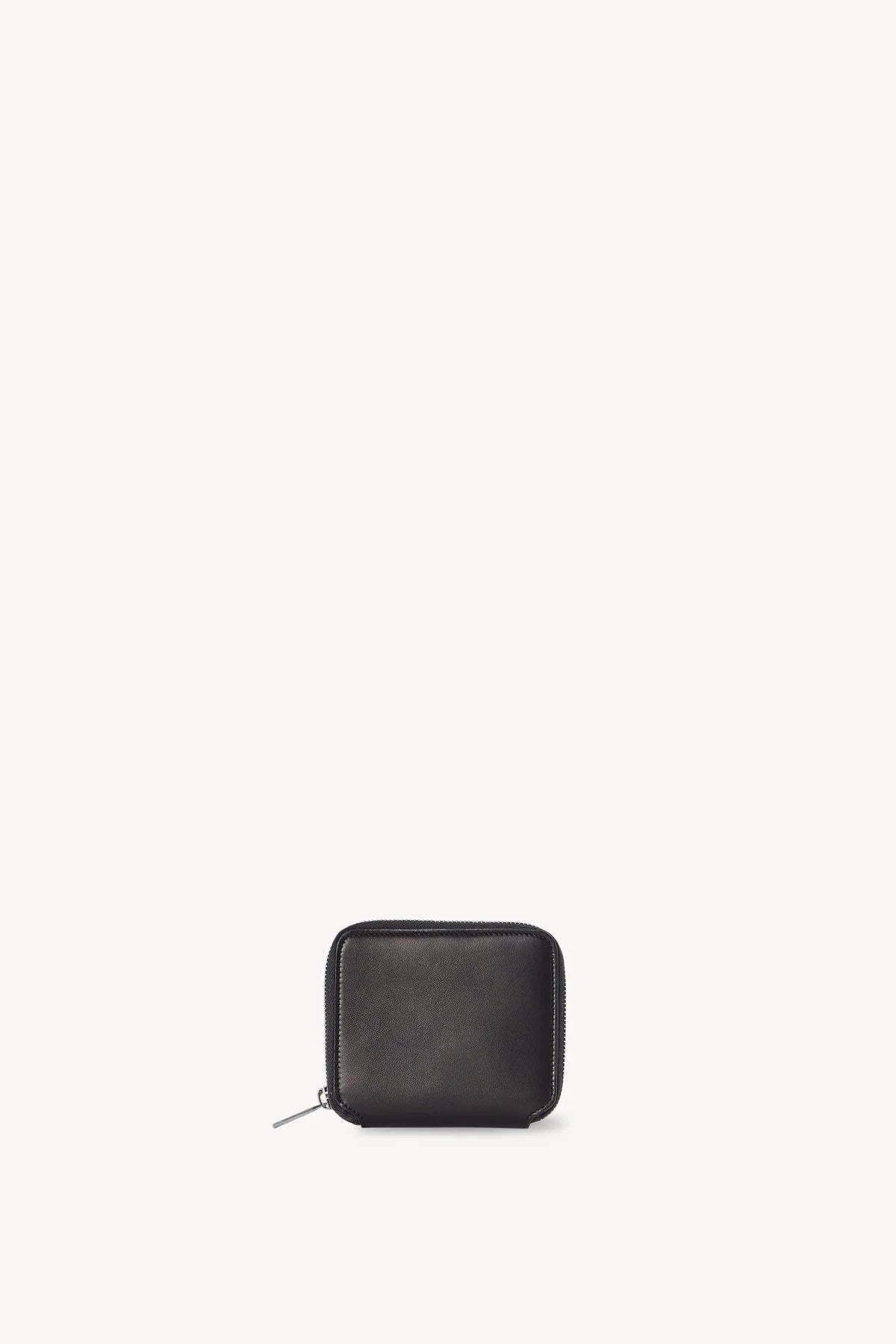 Front view of dark brown small zip wallet on white background, with no model shown.