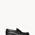Right side view of black soft loafer in eel on white background, with no model shown.