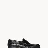 Right side view of black soft loafer in eel on white background, with no model shown.