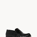 Front slanted view of black soft loafer in eel on white background with no model shown.