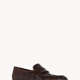 Front slanted view of brown soft loafer in eel on white background with no model shown.