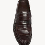 Overhead view of brown soft loader in eel on white background, with no model shown.