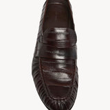 Overhead view of brown soft loader in eel on white background, with no model shown.