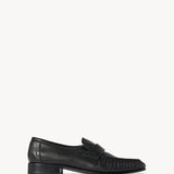 Right side view of black soft loafer on white background, with no model shown.