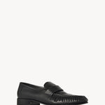Right side slanted view of black soft loafer on white background, with no model shown.
