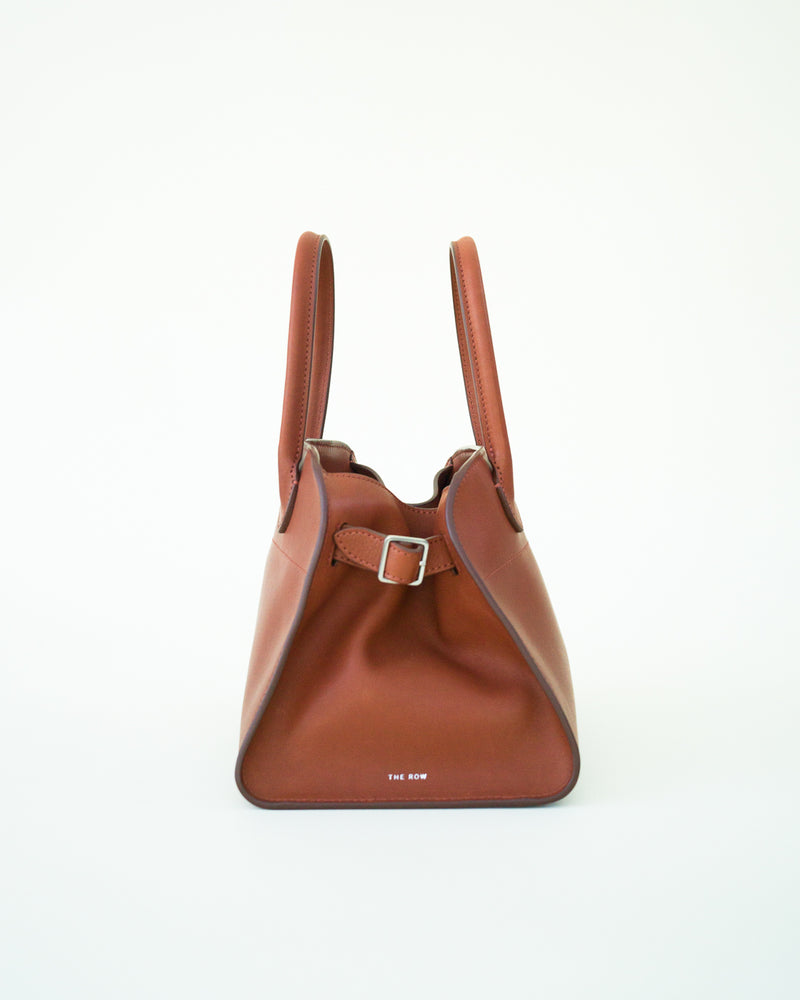Side view of Soft Margaux 10 Bag in brown pictured on white background with no model