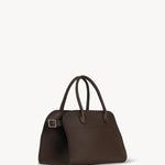 Front slanted view of deep brown soft margaux bag on white background, with no model shown.