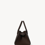Side view of deep brown soft margaux 10 bag on white background, with no model shown.