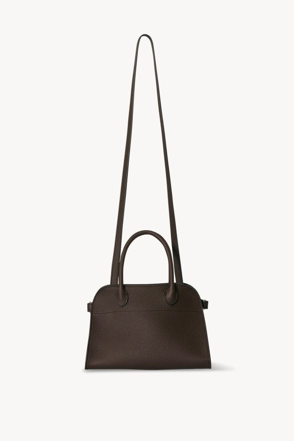Shoulder strap view of deep brown soft margaux 10 bag on white background, with no model shown.