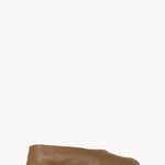 Right side view of mud stella slipper on white background, with no model shown.