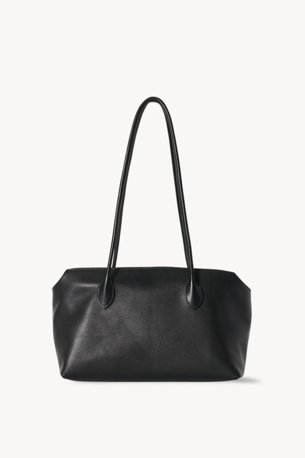 Front view of black terrasse bag on white background, with no model shown.