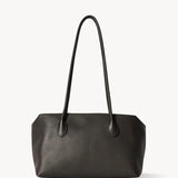 Front view of dark brown terrasse bag on white background, with no model shown.