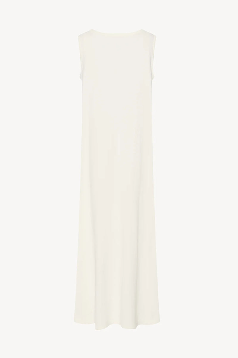 Back view of sleeveless round neck maxi white cotton dress on plain white background, no model shown.