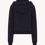 Back view of dark navy timia top on white background, with no model shown.