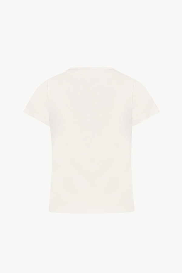 Back view of white tori top on white background, with no model shown.