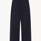 Back view of dark navy ukira pant on white background, with no model shown.