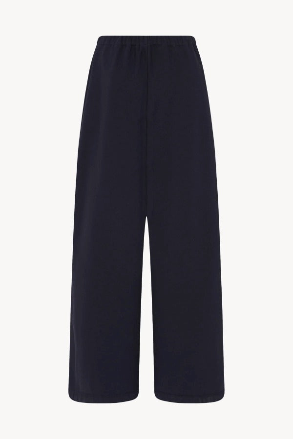 Back view of dark navy ukira pant on white background, with no model shown.