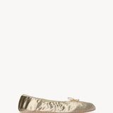 Right side view of taupe round ballet flat on white background, with no model shown.