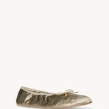 Right side slanted view of taupe round ballet flat on white background, with no model shown.
