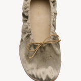 Overhead view of taupe round ballet flat on white background, with no model shown.