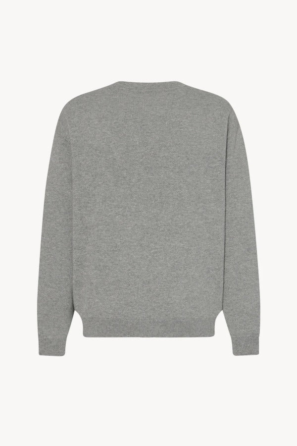 Back view of grey melange vonn caridgan on white background, with no model shown.