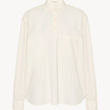 Front view of white erika shirt on white background, with no model shown.