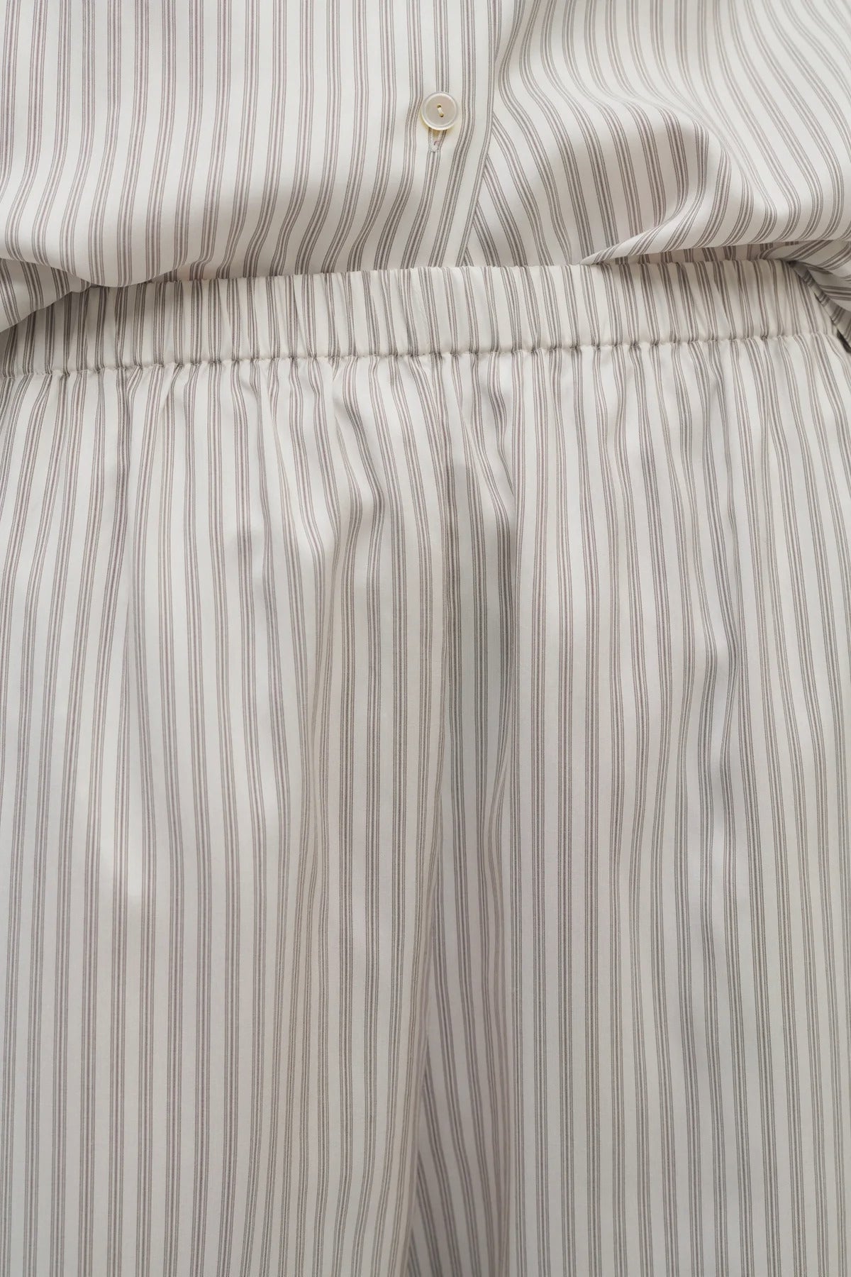 Front closeup view of short with white background.
