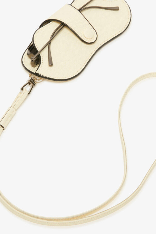 Back alternate view of white valextra glasses case with lanyard on white background, with no model shown.