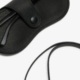 Back alternate view of black glasses case with lanyard on white background, with no model shown.
