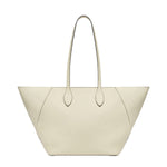 Front open side view of white valextra's small vivi shopping bag on white background, with no model shown.